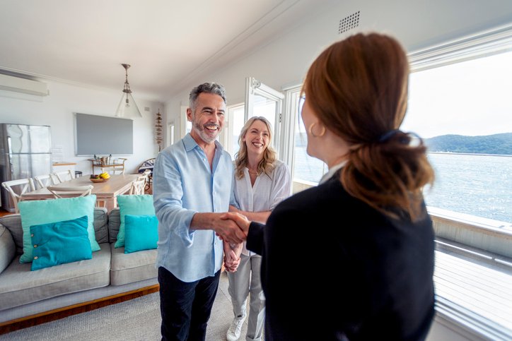 A couple touring a real estate investment.