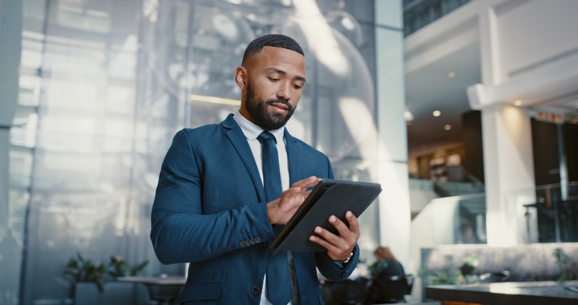 An investor using digital wealth management to rebalance his portfolio.
