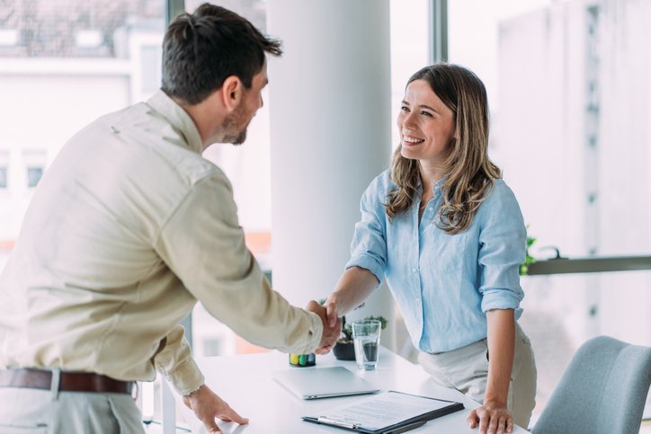 An investor meeting a real estate broker to discuss a potential investment.