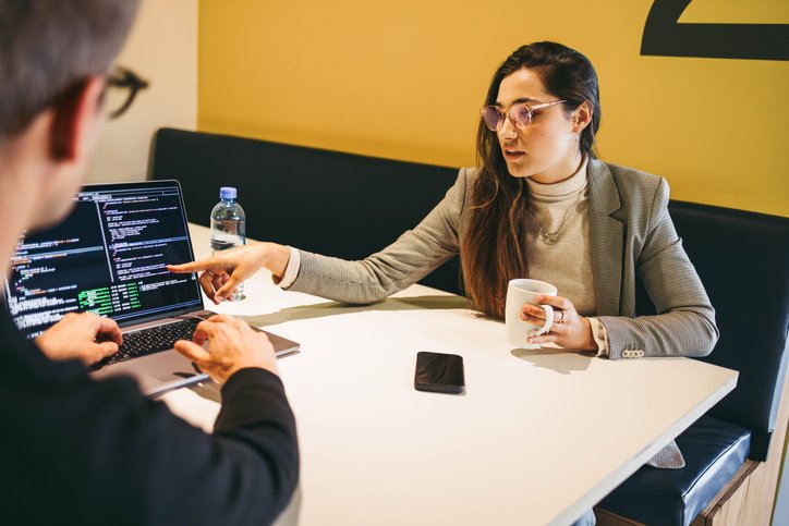 A financial advisor explaining the risks of investing in bonds to a client.