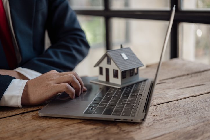 A commercial real estate investor looking up the terms of a bridge loan.